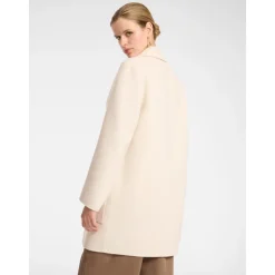 Manteau en tissu double avec revers, boutonnières et poches