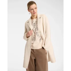Manteau en tissu double avec revers, boutonnières et poches
