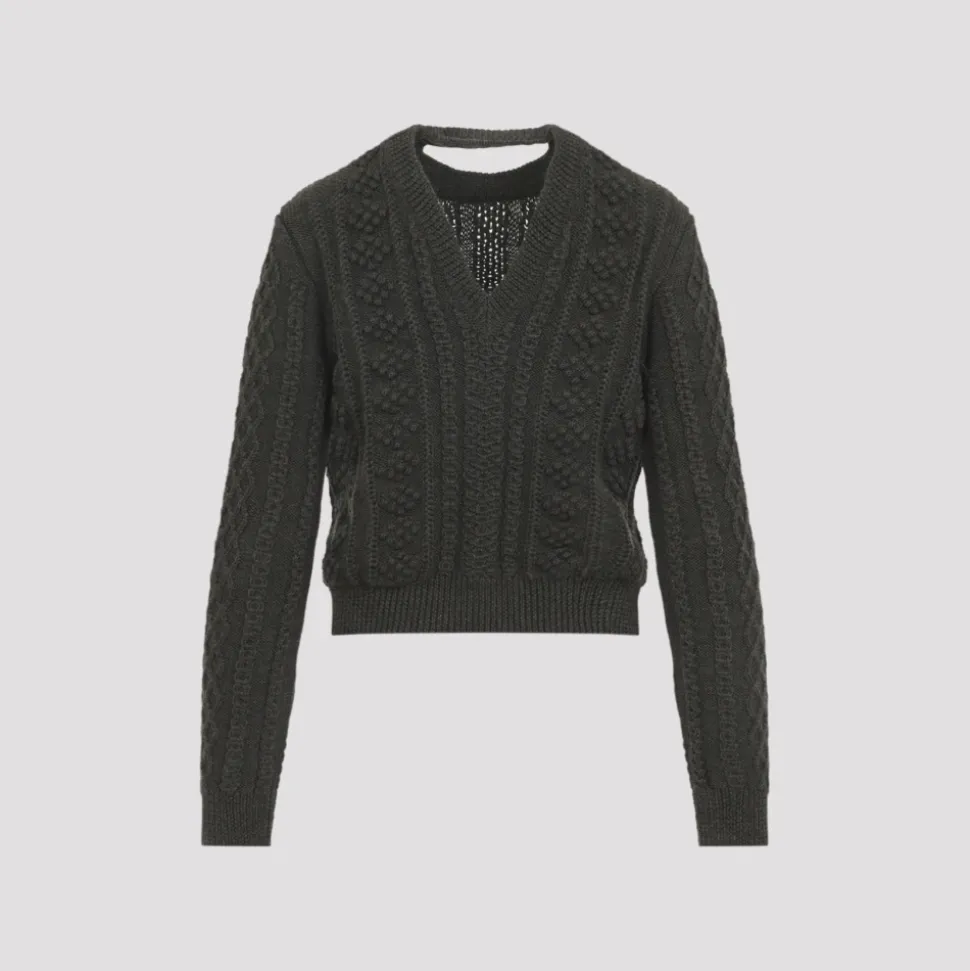 Pull court en maille torsadée